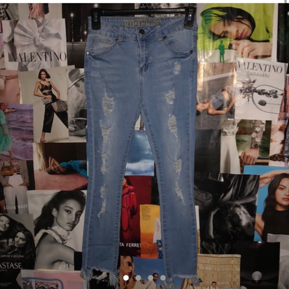 Ripped jeans/ distressed jeans.